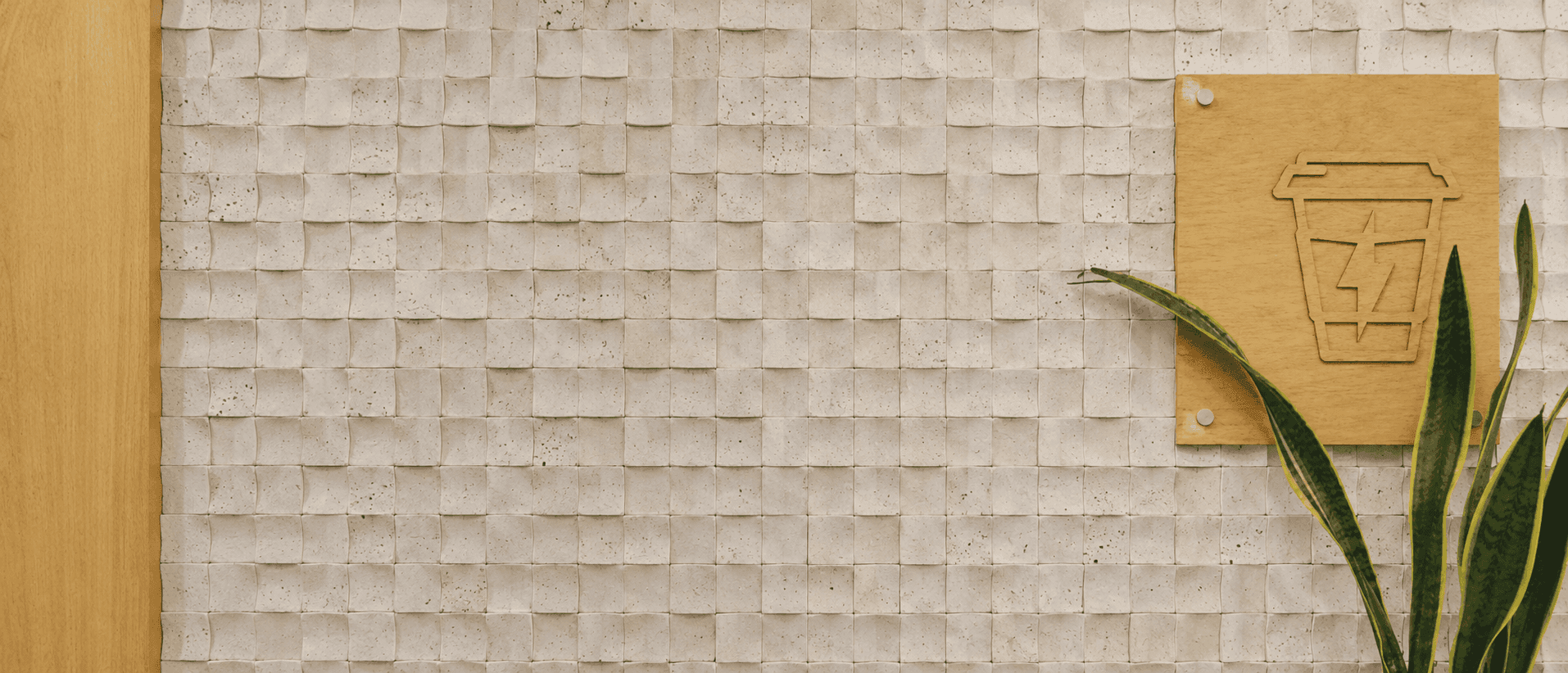 Travertine mosaic feature wall in a café interior